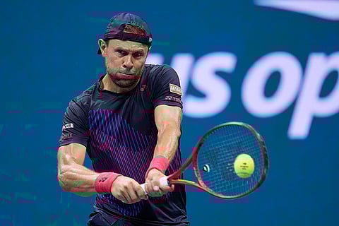 US Open 2024: Radu Albot, of Moldova, returns a shot to Novak Djokovic, of Serbia